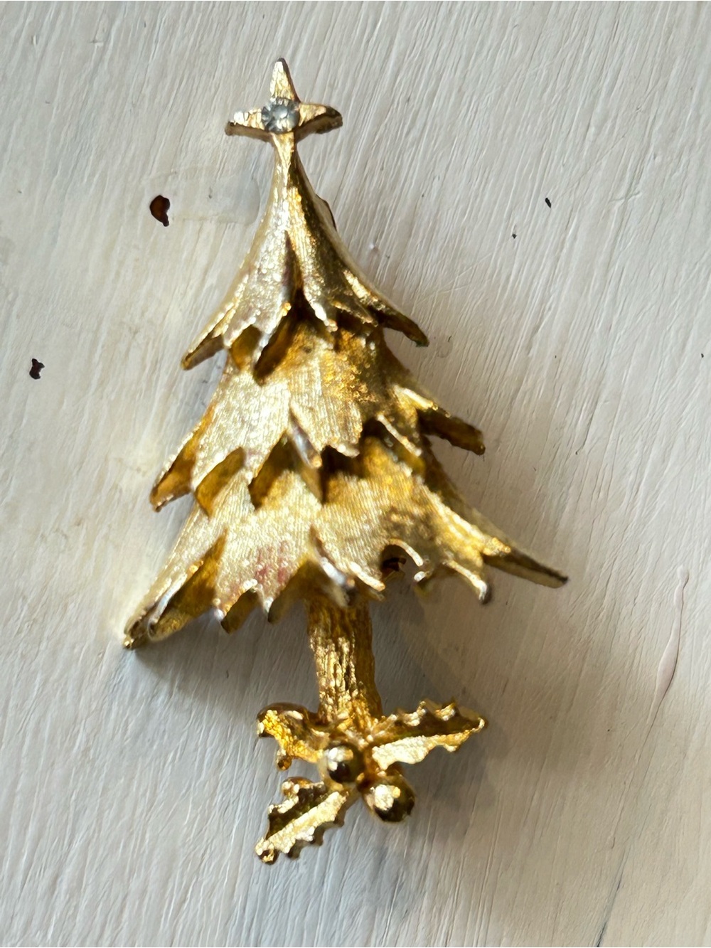 Gold toned Christmas tree with Holly brooch pin